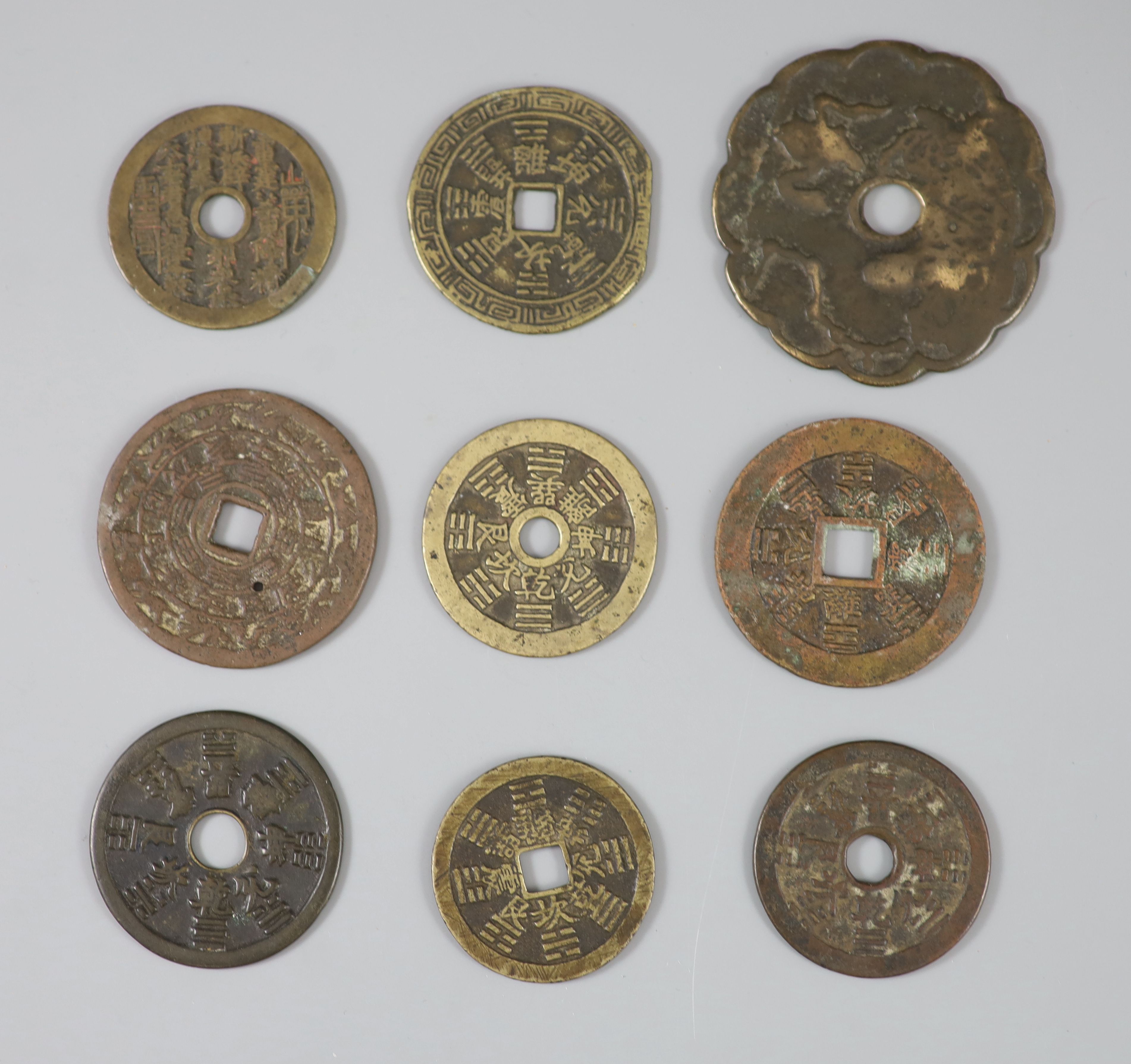 China, 9 bronze charms or amulets, Qing dynasty,